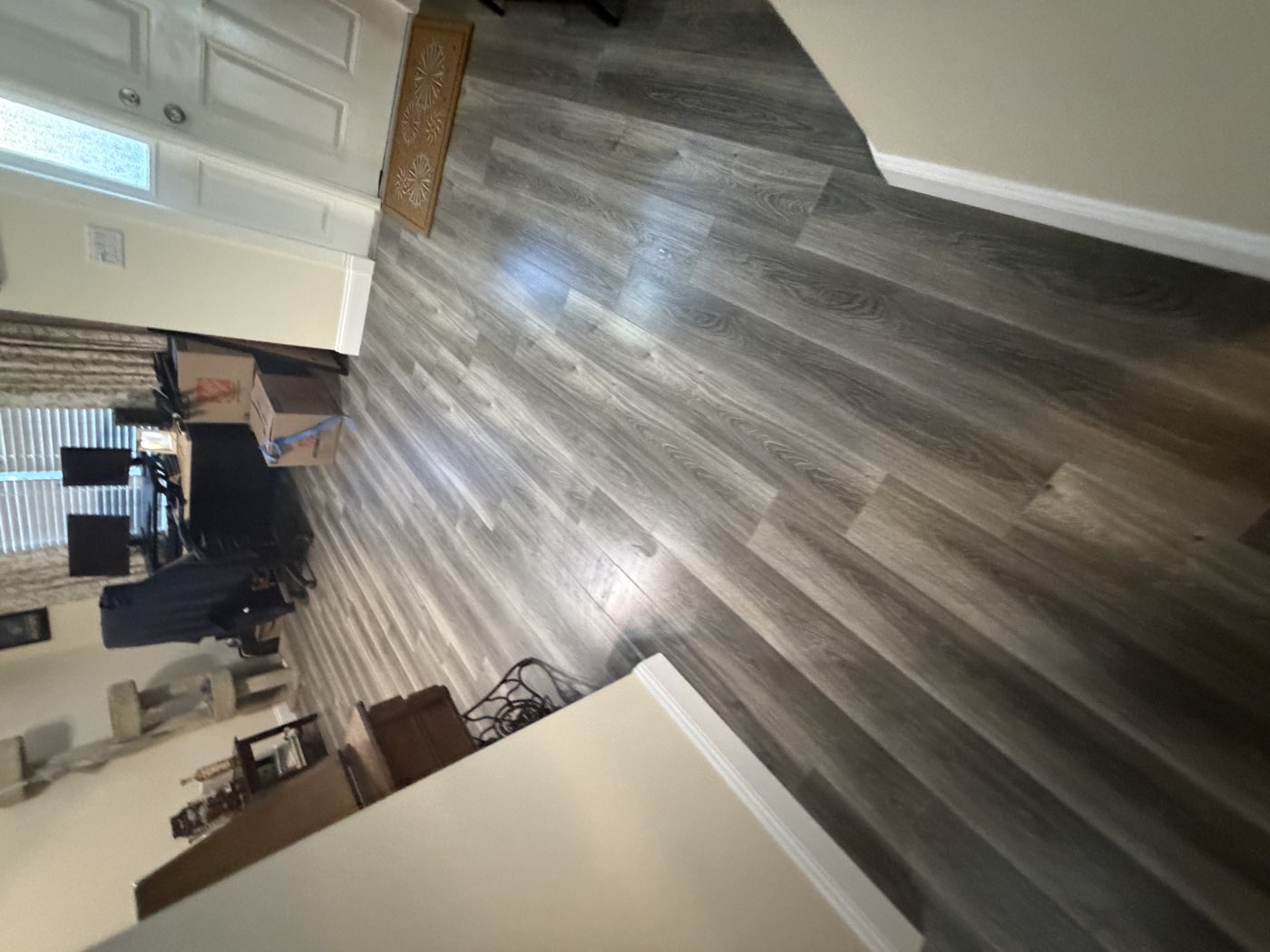 Luxury vinyl plank flooring running through a hallway