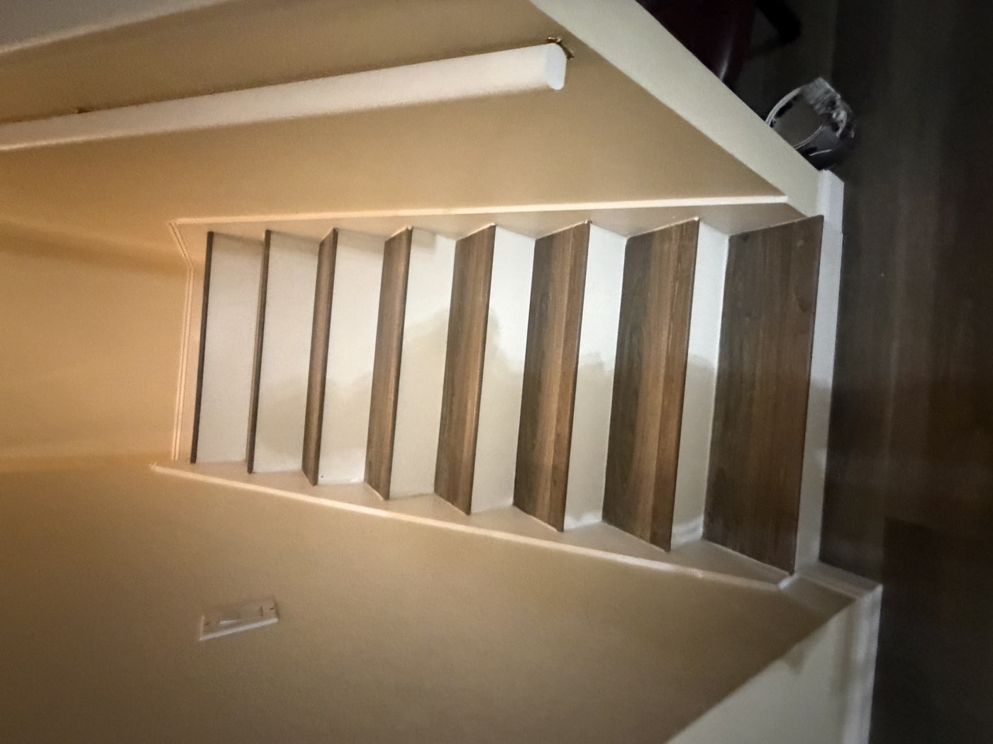 Renovated staircase with wood treads and white risers